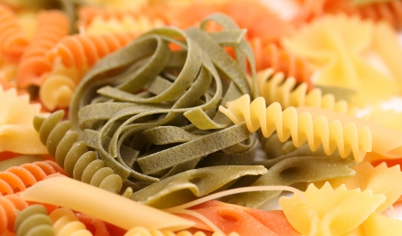 Green tagliatelle paglia e fieno on the backgroun of different pastas.の写真素材