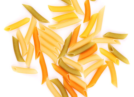 Penne colored pasta isolated on white backgroundの写真素材