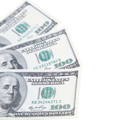Three 100 dollars greenbacks are located left on a white background