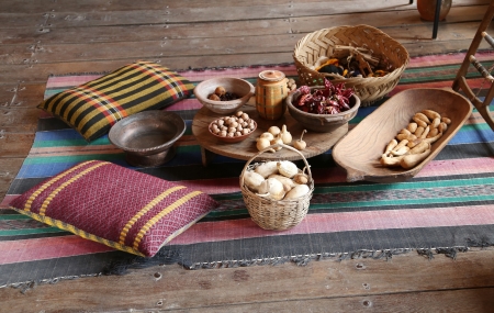 Country composition. Carpet, pillow, basket, plate, table.の写真素材