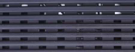 Black radiator enclosure. Close up. Whole background.の写真素材