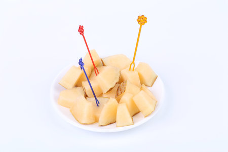 Fresh melon cubes on a plate