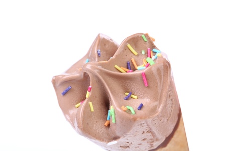 Close up image of chocolate ice cream cone. Sprinkles.の写真素材