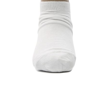 Sock with pleats. Close up. White background.の写真素材