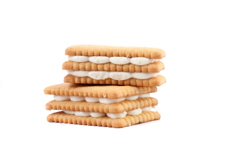 Custard cream biscuits isolated on a white background.の写真素材