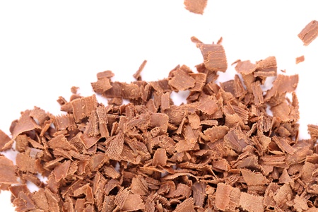 Slices of chocolate. Frame. Top of background is white.の写真素材