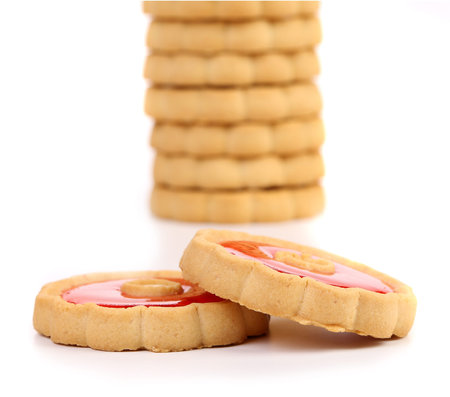 Stack of jam biscuits  Close up  White background 