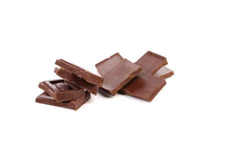 Some dark chocolate bars. Close up. White background.