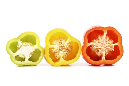 Three half of bell pepper on white backgroundの写真素材