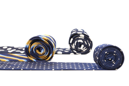bright rolled ties isolated on a white backgroundの写真素材