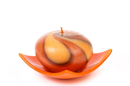 Decorative colourful candle. Isolated on a white background.の写真素材