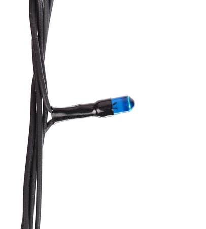 Blue lamp of festive garland. White background.の写真素材