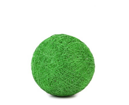 Ball of green thread. Isolated on a white background.の写真素材