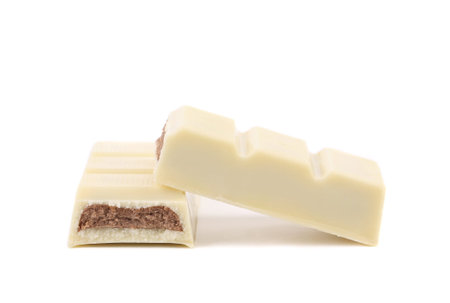 white chocolate bar with filling on a white backgroundの写真素材
