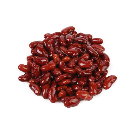 Red beans close up. Isolated on a white background.