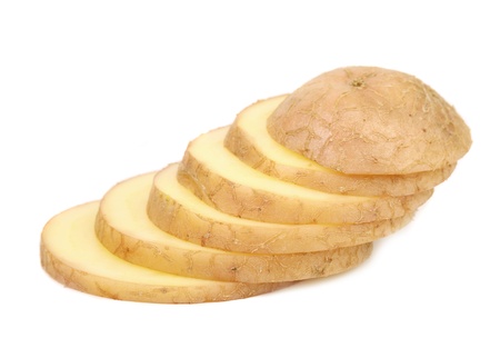 Stack of potato cut isolated on a white background close upの写真素材