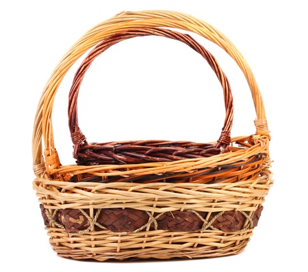 Vintage weave wicker baskets isolated on a white backgroundの写真素材