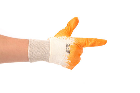 Working hand in glove like of gun. Isolated on a white background.