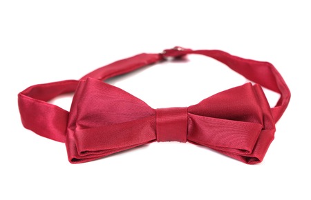 Red bow tie isolated on a white background.の写真素材