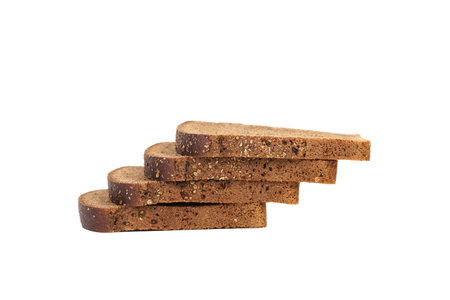 Slices of brown bread on a white background.