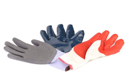 Three different colors protective gloves. Isolated on a white background.