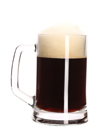 Big mug full with beer. Isolated on a white background.の写真素材
