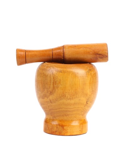 Wooden mortar with a pestle above. Close upの写真素材