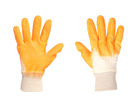 Rubber protective orange gloves on a white backgroundの写真素材