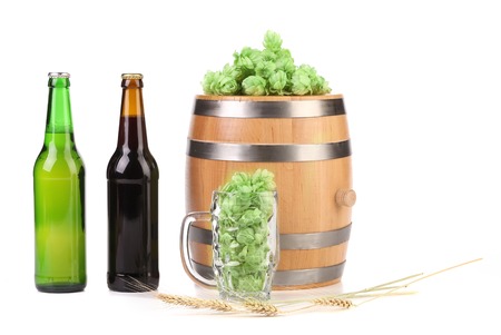 Barrel mug with barley hop and bottle of beer. Isolated on a white background.の写真素材