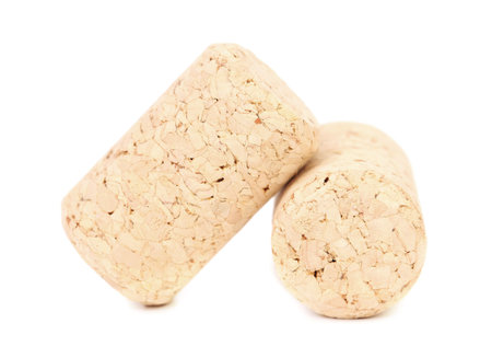 Close up of two corks. Isolated on a white backgropund.の写真素材