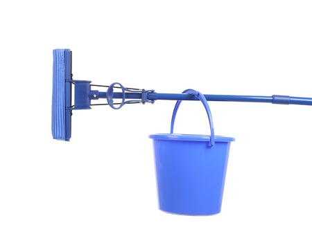 Blue bucket on mop with sponge. Isolated on a white background.の写真素材