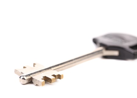 Modern steel-plastic key. Isolated on a white backgroundの写真素材