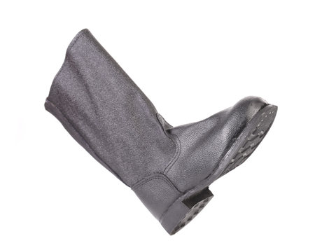 High rubber boot black color. Isolated on a white background.