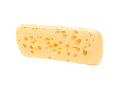 Close up of cheese slice. Isolated on a white background.