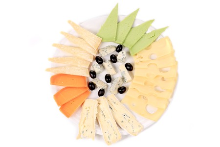 Blue cheese and olives. Close up. Isolated on a white background.の写真素材