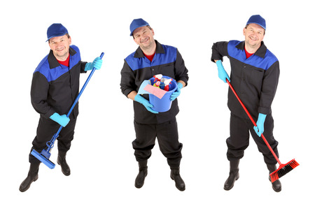 Man with cleaning broom. Isolated on a white background.の写真素材