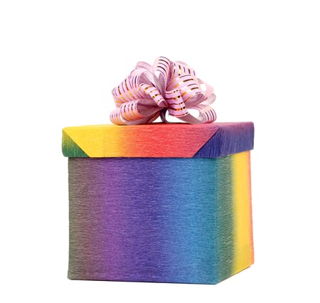 Multicolored gift box with ribbon. Isolated on a white background.の写真素材