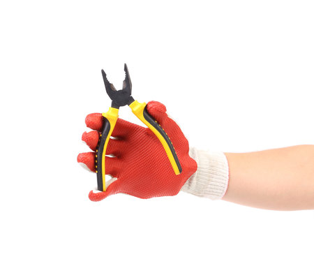 Hand in gloves holding pliers. Isolated on a white background.