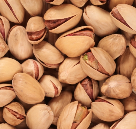 Close up of fresh pistachios. Whole background.の写真素材