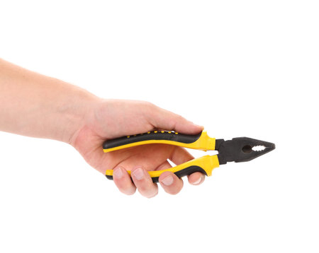 Hand holding pliers. Isolated on a white background.