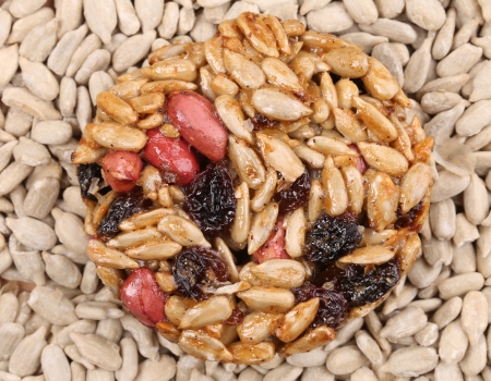 Round candied seeds and nuts. Whole background.の写真素材