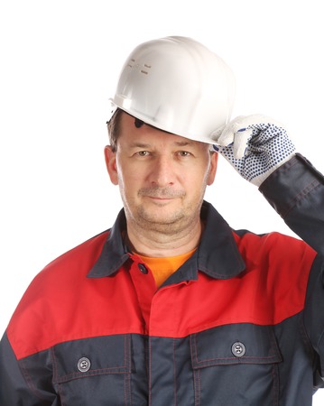 Confident worker portrait with hard hat. Isolated on a white background.の写真素材