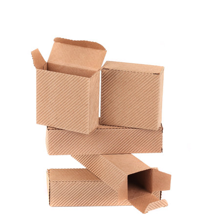 Stack of brown gift boxes. Isolated on a white background.