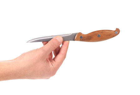 Hand holds kitchen knife. Isolated on a white background.