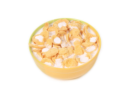 Bowl of cereal with milk. Isolated on a white background.