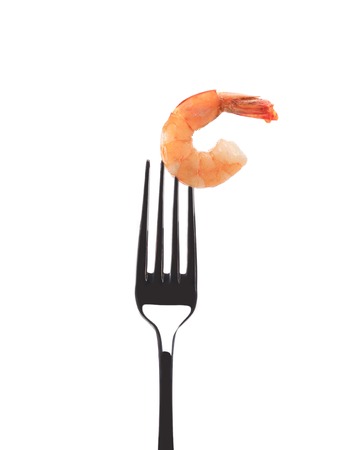 Shrimp on fork. Isolated on a white background.の写真素材