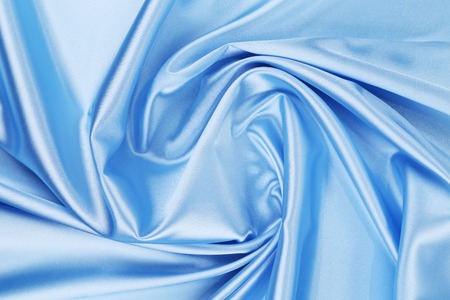 Close up of blue silk fabric background. Whole background.の写真素材