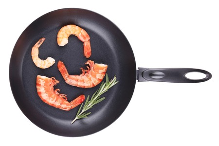 Fresh boiled shrimps on frying pan. Isolated on a white background.の写真素材