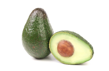whole and half avocados isolated on white backgroundの写真素材