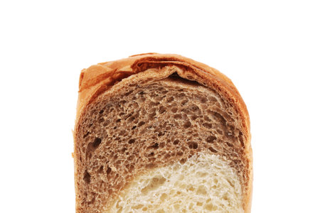 Brown and white bread slice. Isolated on a white background.